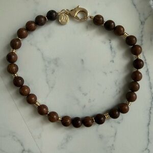 Jane win Wood and gold beaded necklace
